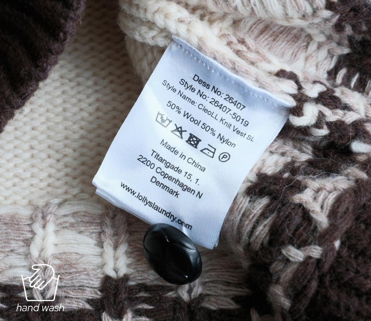 Image of a care label inside a knit sweater